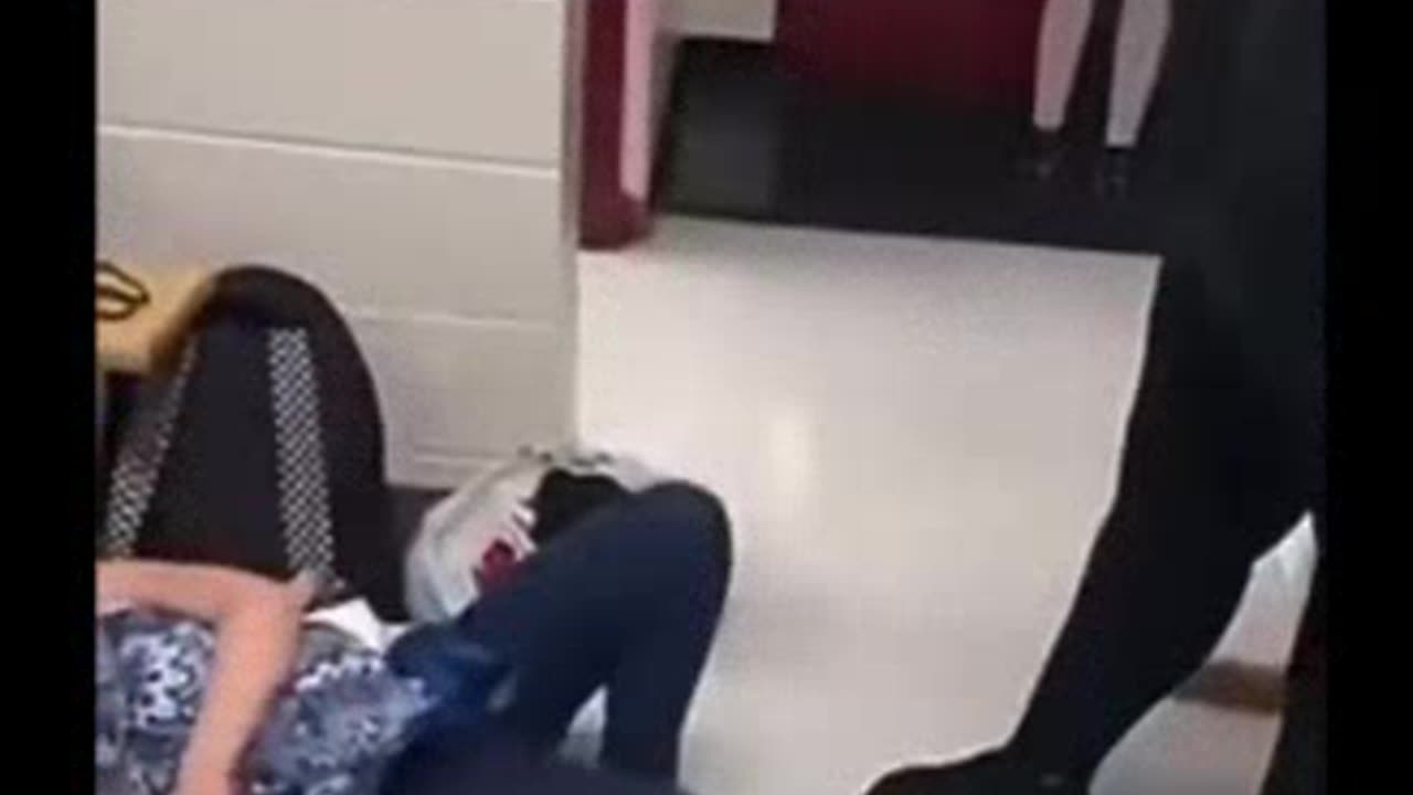 Young student get a "Smackdown" hitting her head on wall & bench.