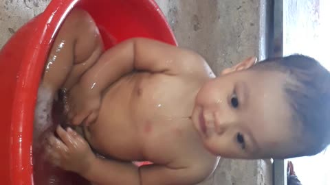 baby by bathing in the water