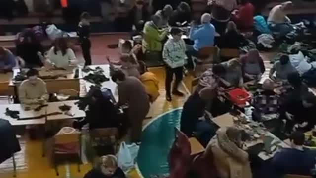 Children, instead of going outside, are forced to knit camouflage nets.