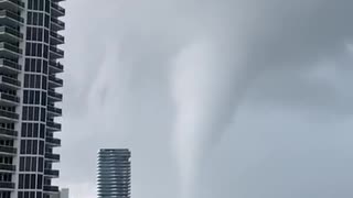 Waterspout-turned-tornado sweeps coast as thunderstorms pound South Florida