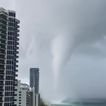 Waterspout-turned-tornado sweeps coast as thunderstorms pound South Florida