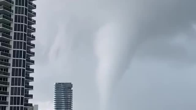 Waterspout-turned-tornado sweeps coast as thunderstorms pound South Florida