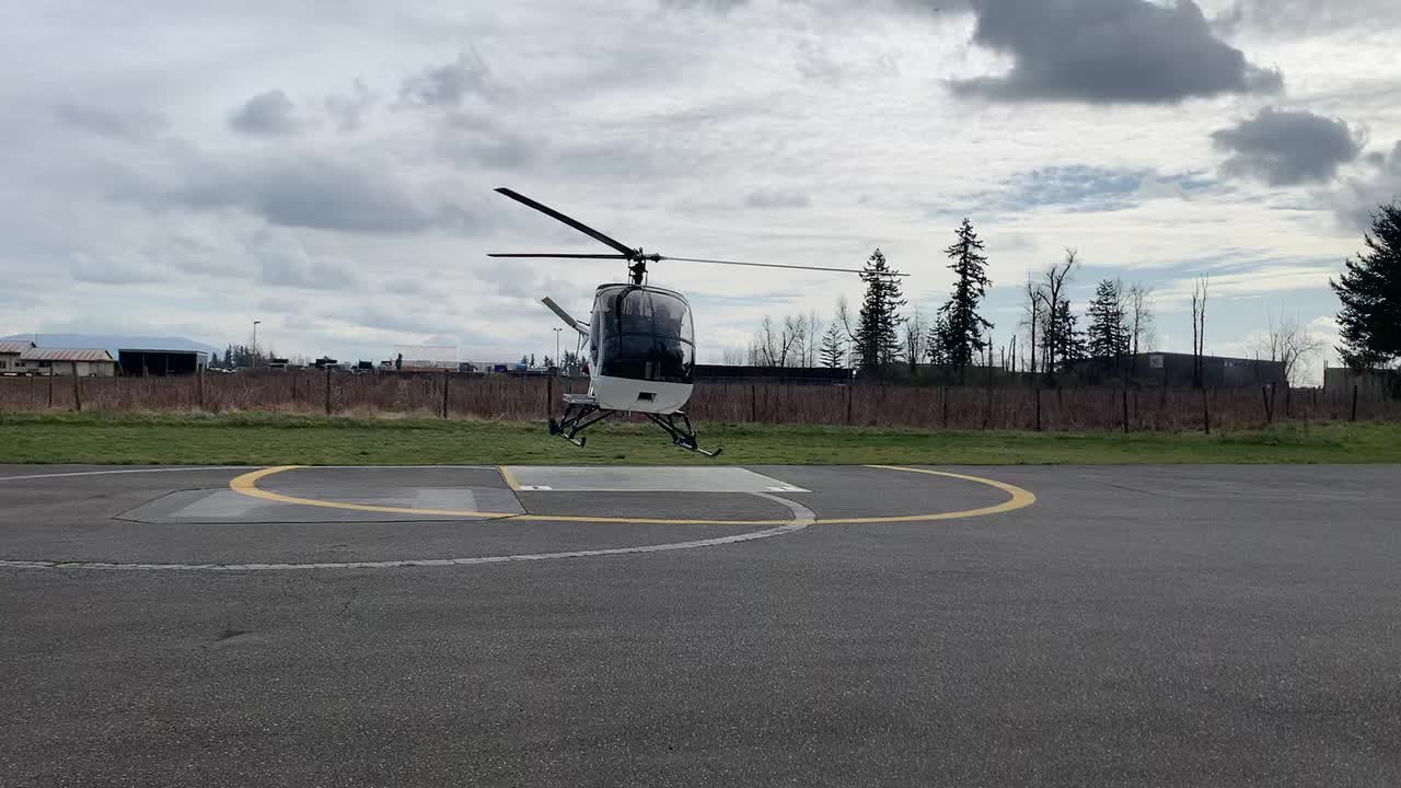 Schweizer helicopter take off