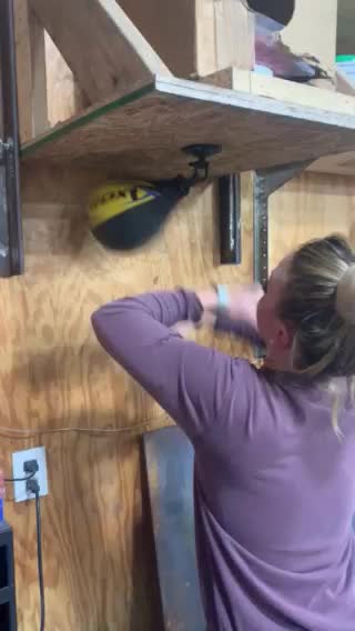 Rachel punching the bag