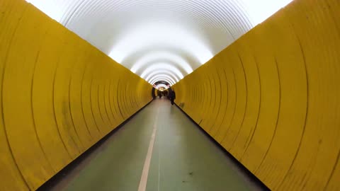 Weird Time Lapse Video of a Long Passage Tunnel For People.