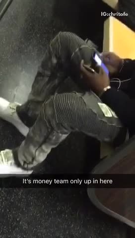 Man white shoes with dollar bills money