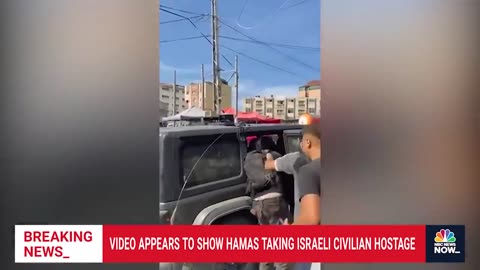 Video appears to show Hamas taking Israeli civilian hostage