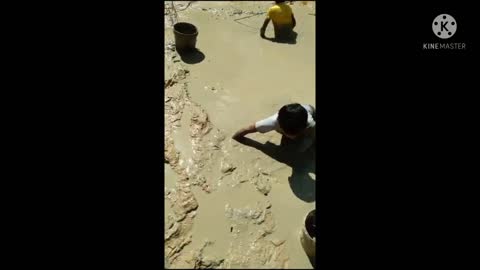 Little boys hand catching big & small fish