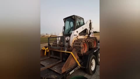 Extending the culvert pipes. Bobcat S250 skid steer in action!