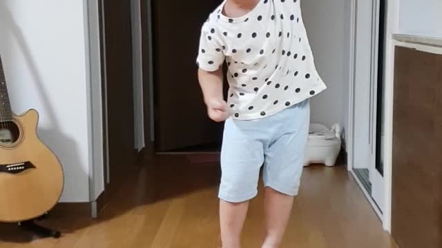 Cute boy dancing monkey
