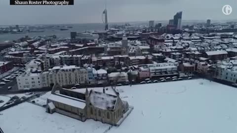Drone footage shows snow-covered Portsmouth as 'mini beast from the east' hits