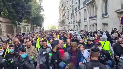 French Police Walk in front of Protesters During Lockdown Protests