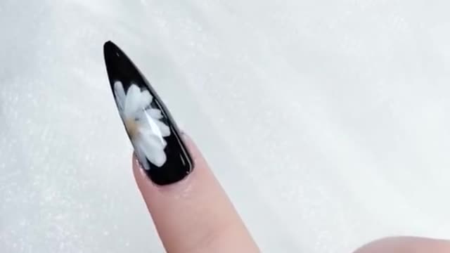 Here comes with the black and white nail design