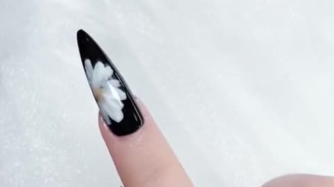 Here comes with the black and white nail design