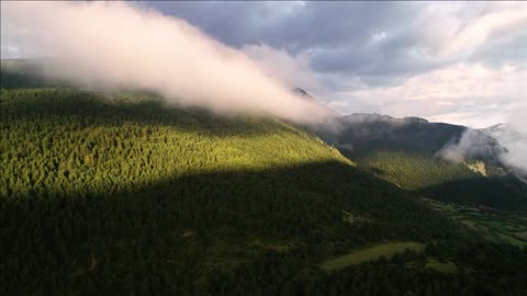 aerial view of clouds covering pyrenees mountains catalonia spain