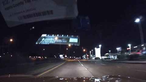 Man Almost Gets Hit Walking Across Highway at Night