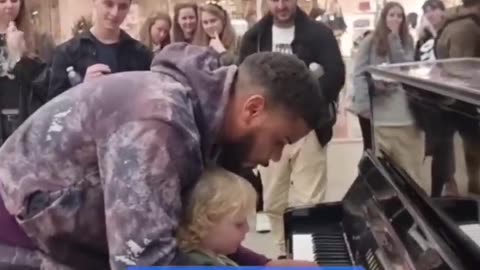 A child surprises his parents by playing a piano song