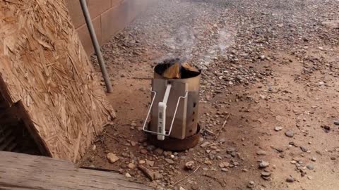 Firing a clay bowl using a charcoal chimney