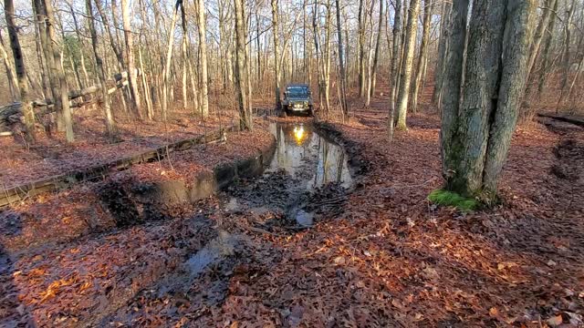 Wrangler through mudhole