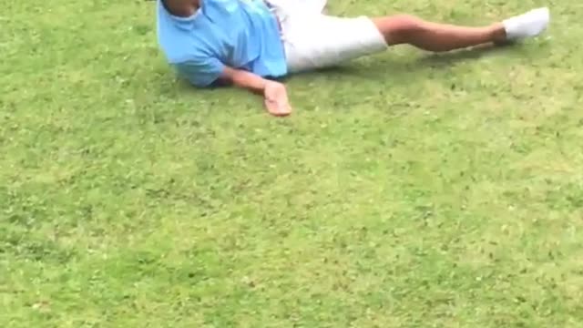 Backyard men throw punch