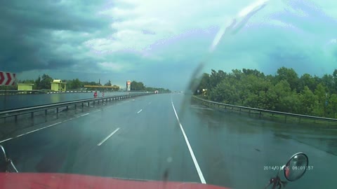 Hydroplaning Car Spins on Highway