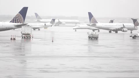 The airport is swarming with planes ready to take off