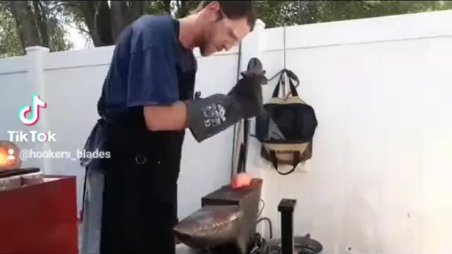 Turning a ball pein hammer head into a spiked hatchet head.