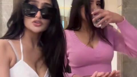 Party Vibes: Two Girls Mimic & Jam to the Beat!