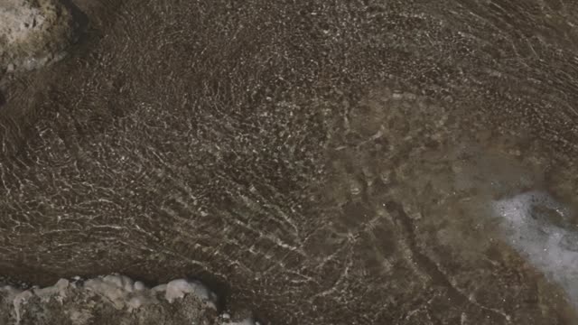 Clear Waters Flowing on Natural Rock Formations