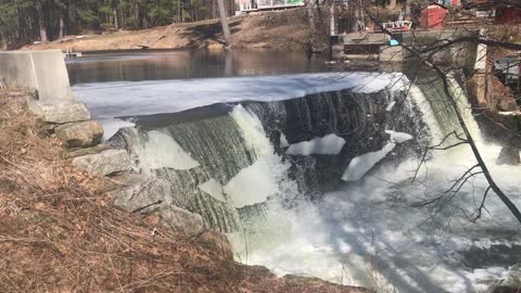 Ice Sheet Crumbles Off Waterfall