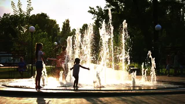 waterfall, kids are playing, so nice