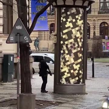 Footage show students hiding on a ledge during mass shooting in University in Prague
