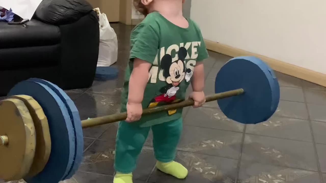 Little baby weight lifting