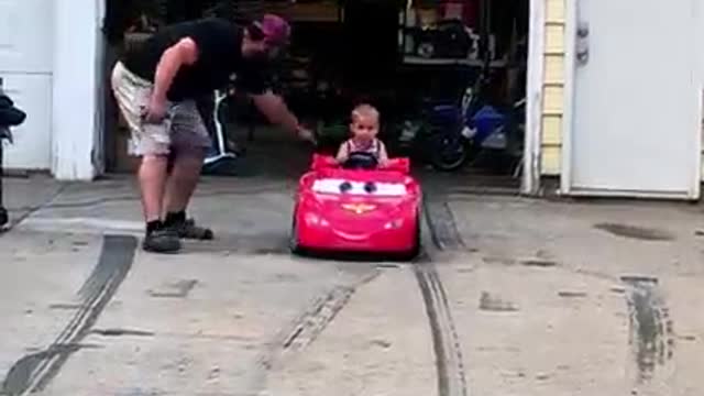 3 year old drifts in his heavy power toy wheels!