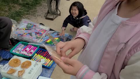 9-year-old Min-yi who draws sweets