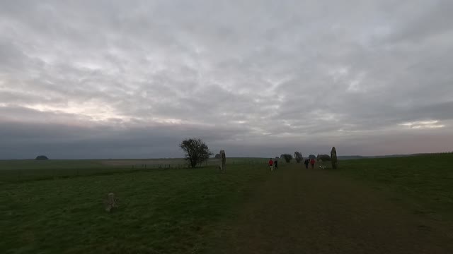 Walking away from ancient stone rows.