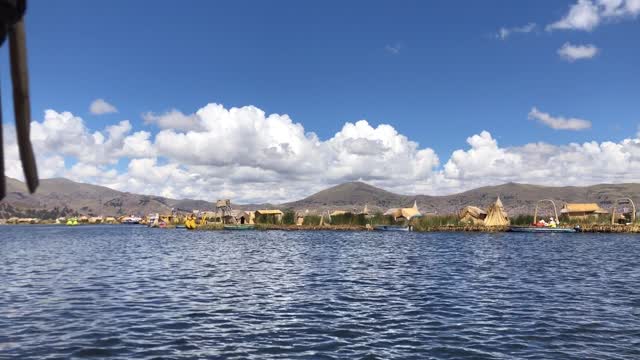 Girls singing at titicaca lake