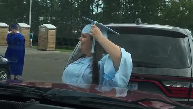 Mask at daughters graduation outside
