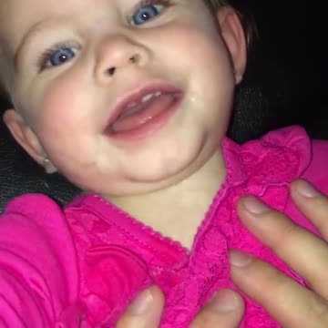 Baby girl has the giggles