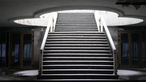 snow-falling-in-an-open-space-of-building