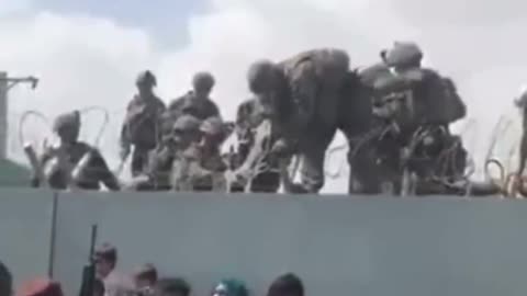 Babies Being Pulled Over Walls by U.S. Soldiers in Afghanistan