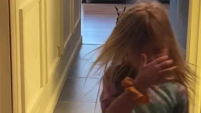 Baby Goat Plays with Kiddos Down Hallway