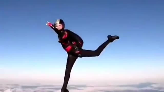 Skydiver close-up aerial swivel splits