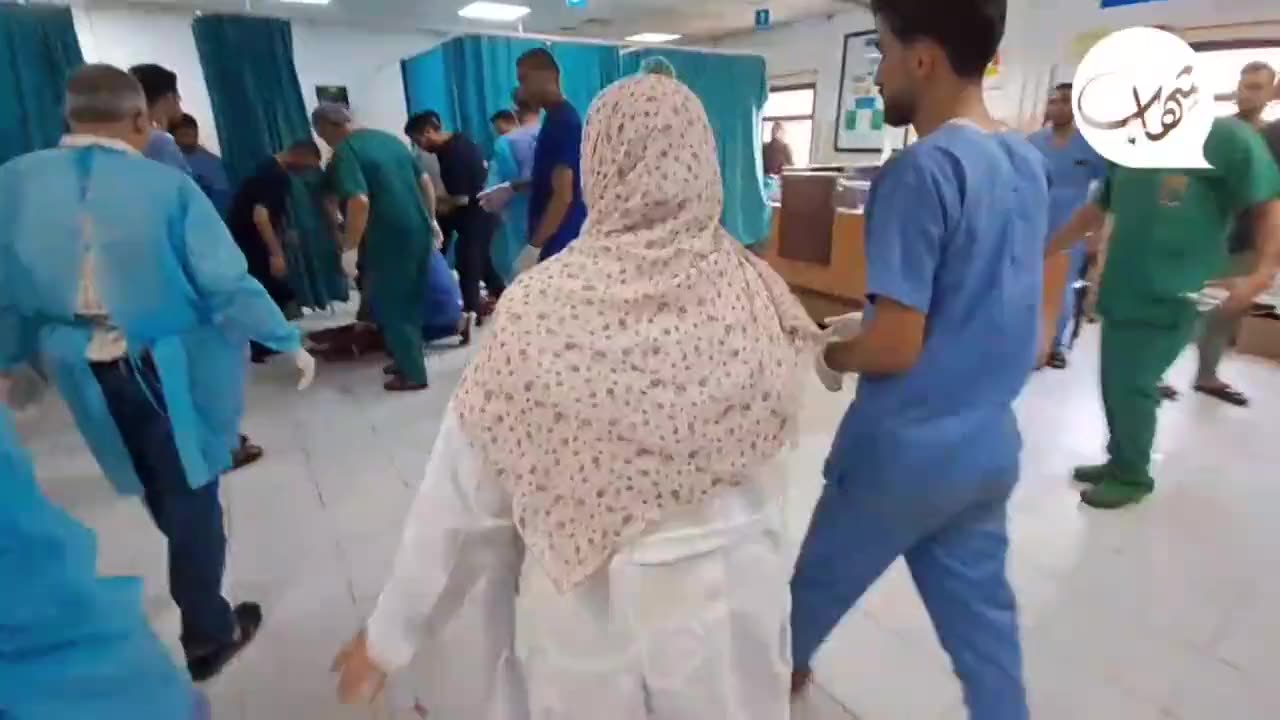 Palestinian nurse working for days non-stop suddenly receives her own daughter on a stretcher