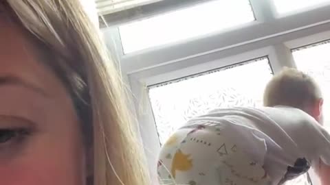 Parent on Toilet Interrupted by Kiddo Climbing Windowsill