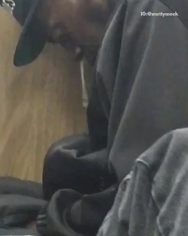 Guy sleeping black hat long booger mucus dripping out nose