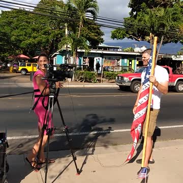 KHNL news video crashed by passionate passerby