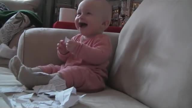 Baby Laughing while Ripping Paper