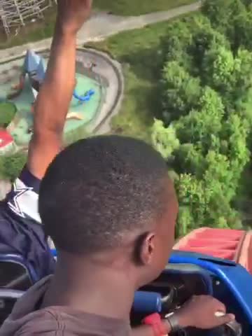 Man riding a golf cart