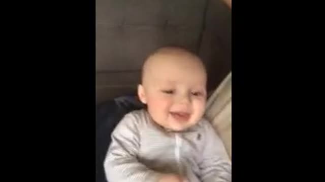 Baby cracks up!